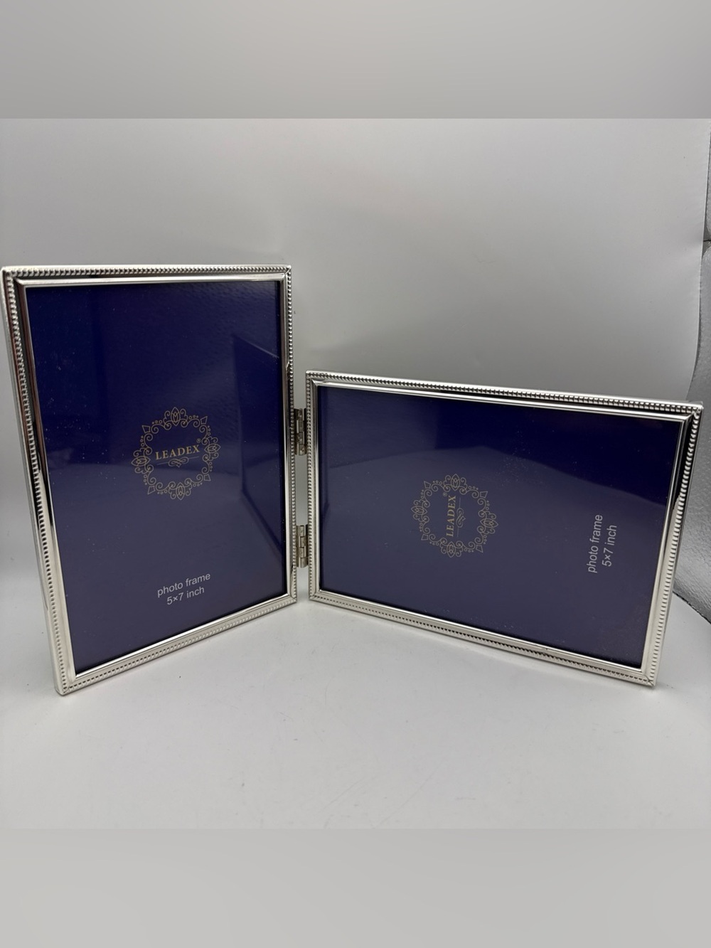 Silver-tone Metal Bi-Fold Double 5x7 Photo Frame Black Velveteen Back Asymmetric